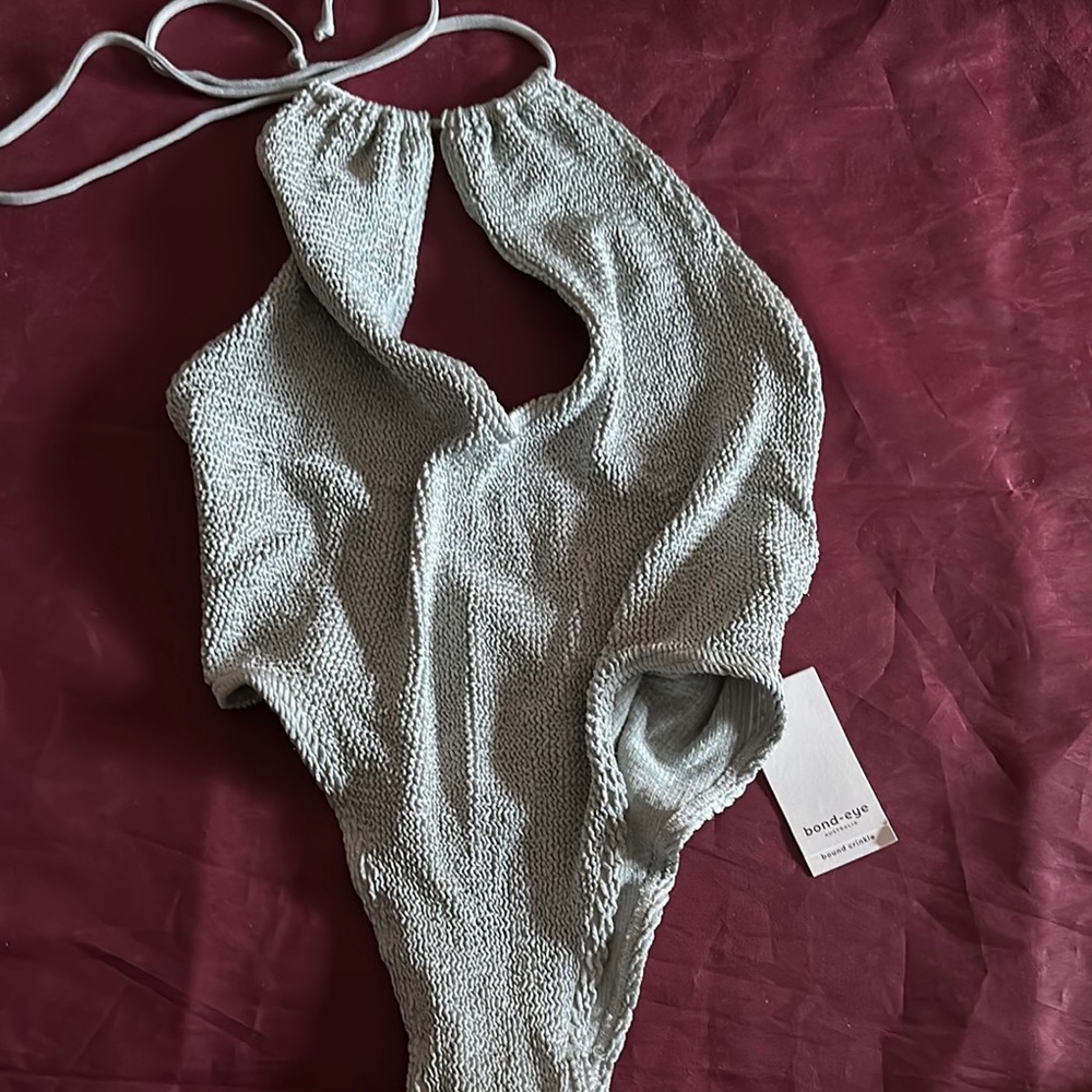 Textured Gray One-Piece Swimsuit
Slight Baby Bluish color 

Backless